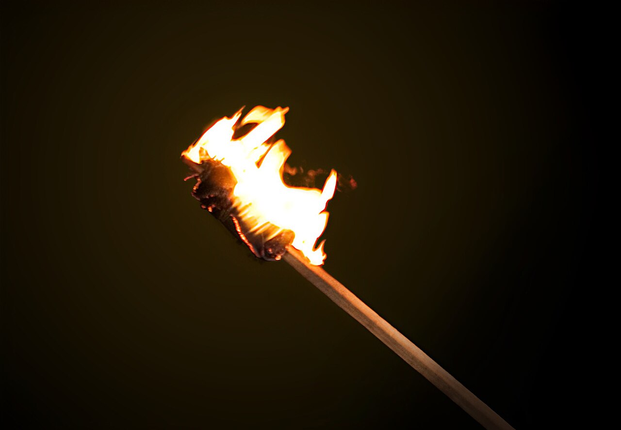 A torch burning in the dark, the torch of Hecate