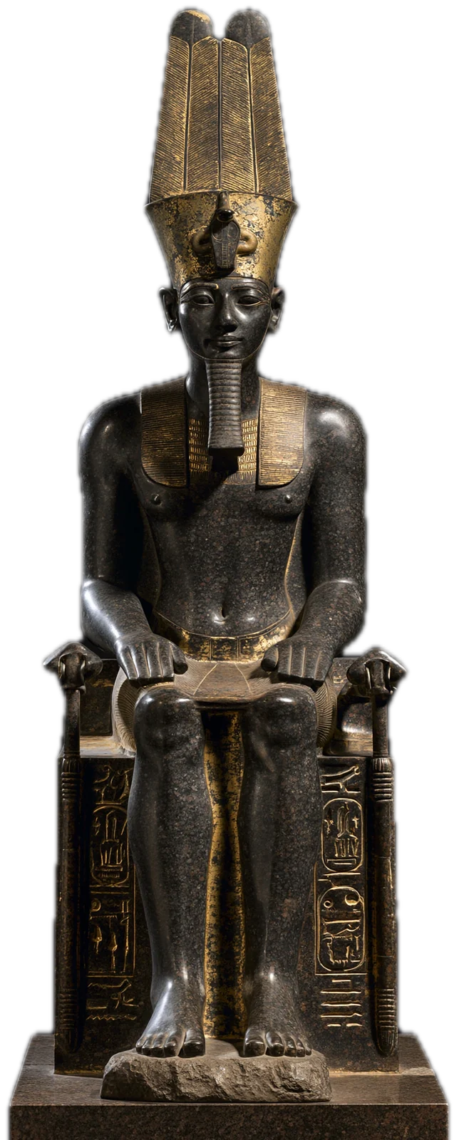 Amun-Ra enthroned in black granite under a gilded double-plumed crown, the God the Greeks called Zeus-Ammon
